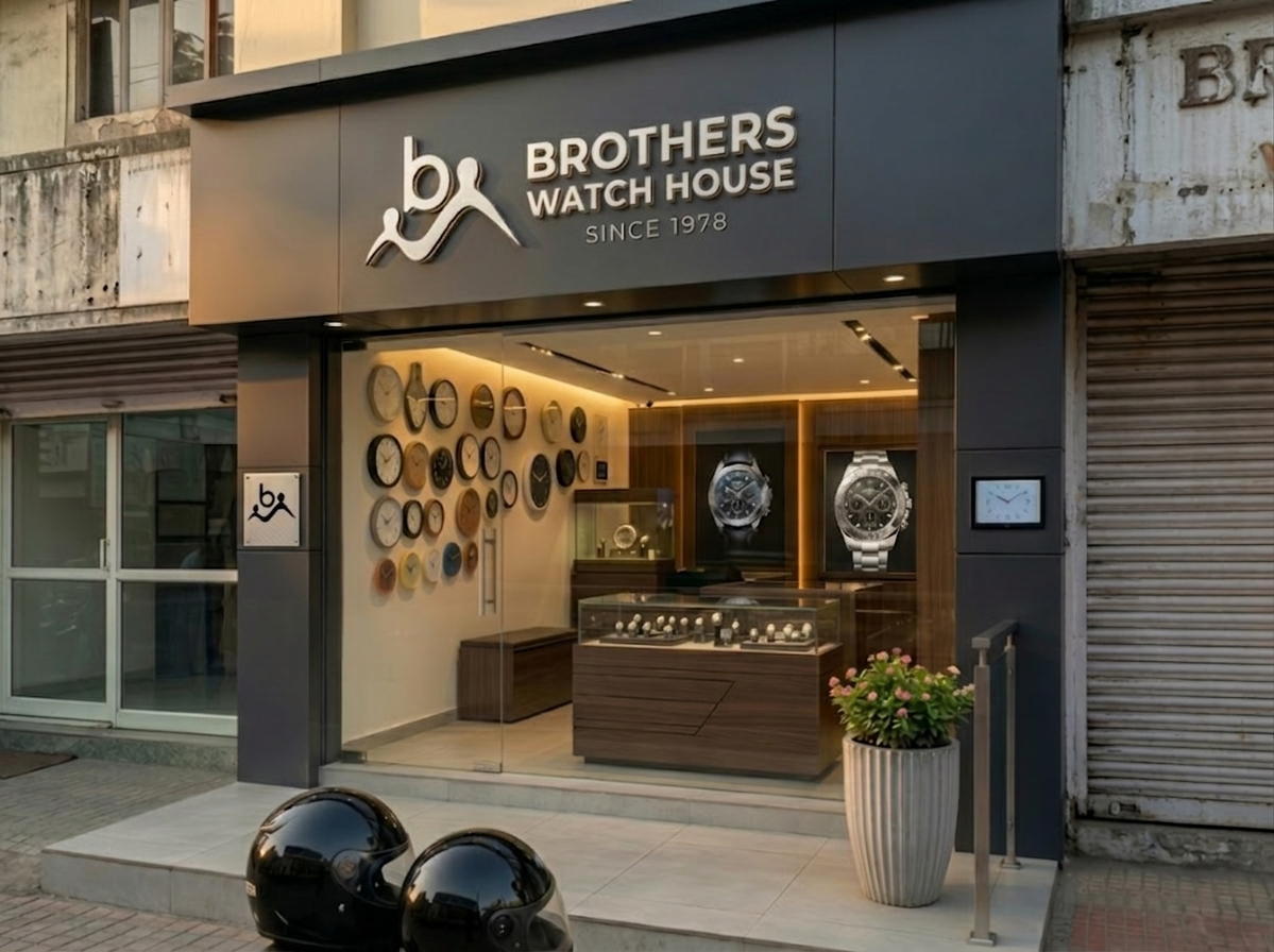Modern Brothers Watch House storefront with dark Gray exterior, metallic signage reading ‘Since 1978,’ large glass windows revealing wall clocks and wristwatch displays inside.